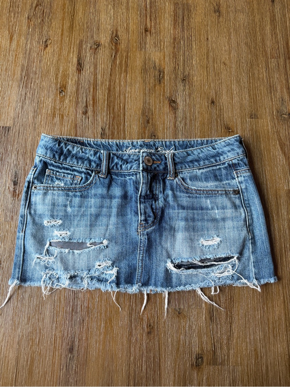 American Eagle denim jean mini skirt with button-fly size 4